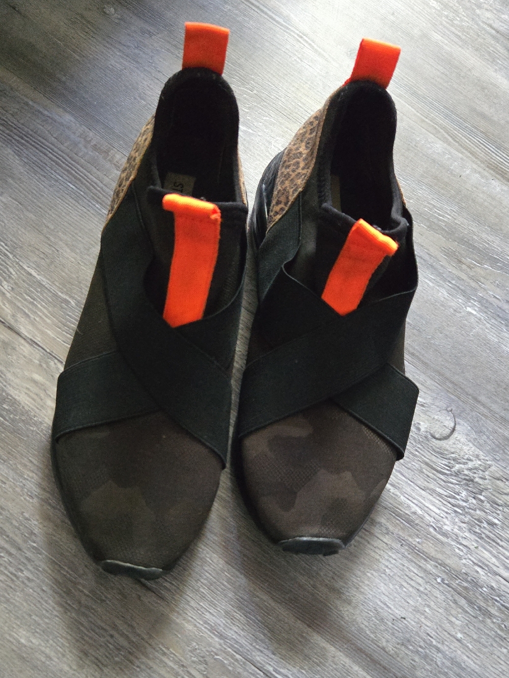 Steve Madden Black Slip-On Sneakers with Orange Pull Tabs